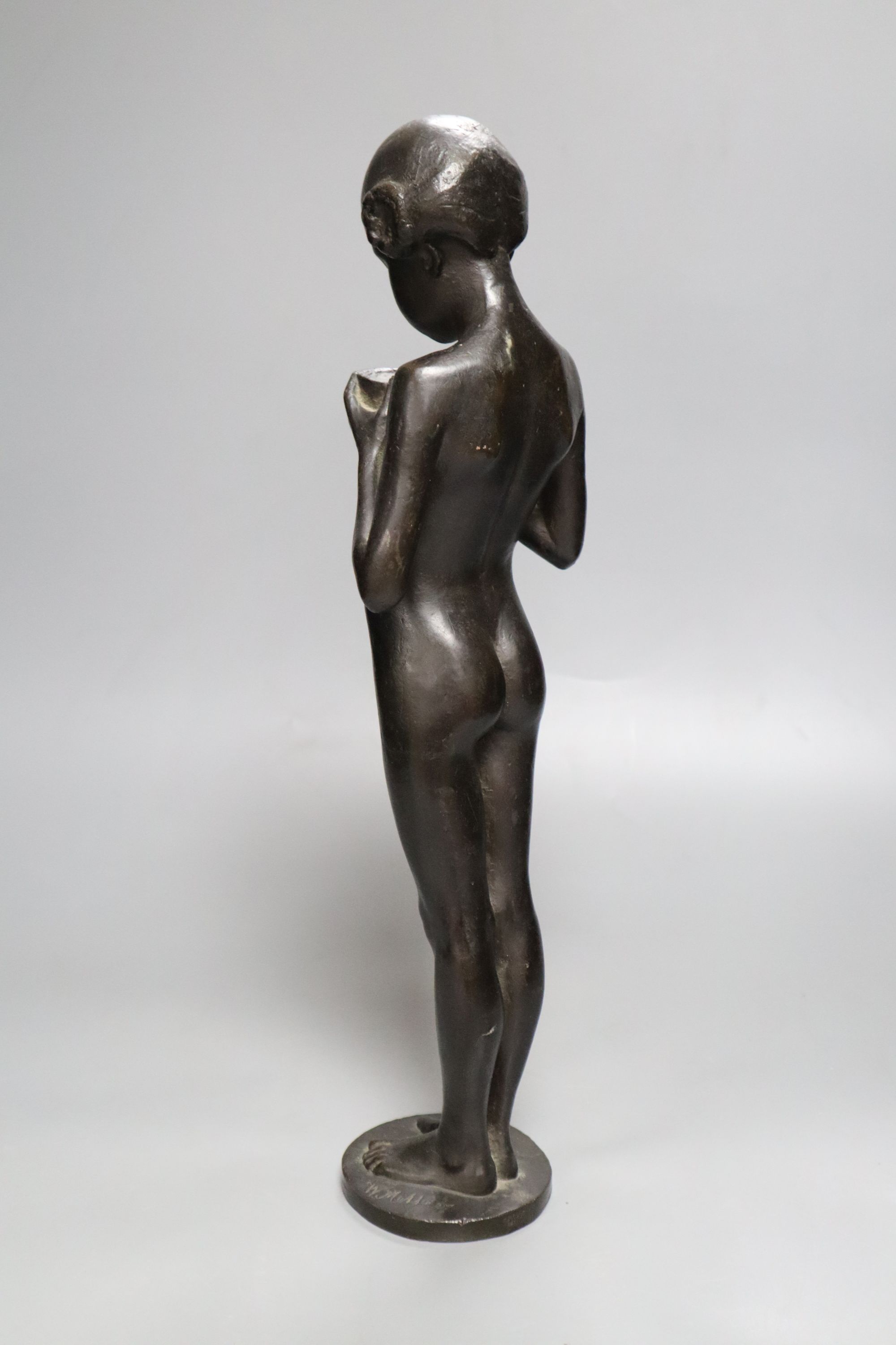 A bronze of a girl with bowl, signed W. Mellor, height 39cm